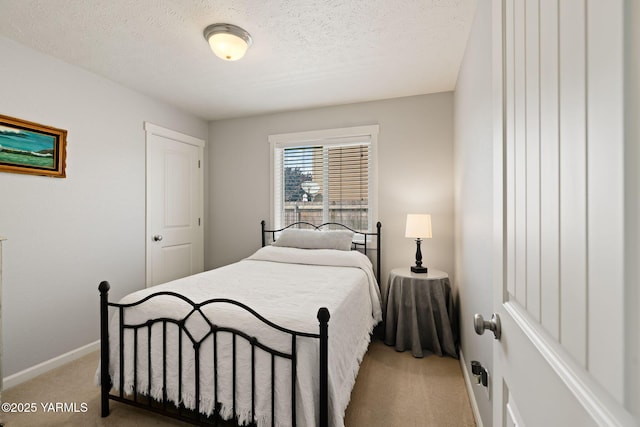 212 Golding St, Moxee, WA 98936 - carpeted bedroom with baseboards and a textured ceiling