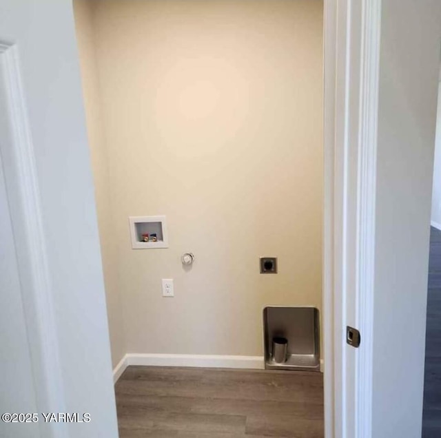 clothes washing area featuring hookup for an electric dryer, hookup for a washing machine, baseboards, gas dryer hookup, and wood finished floors
