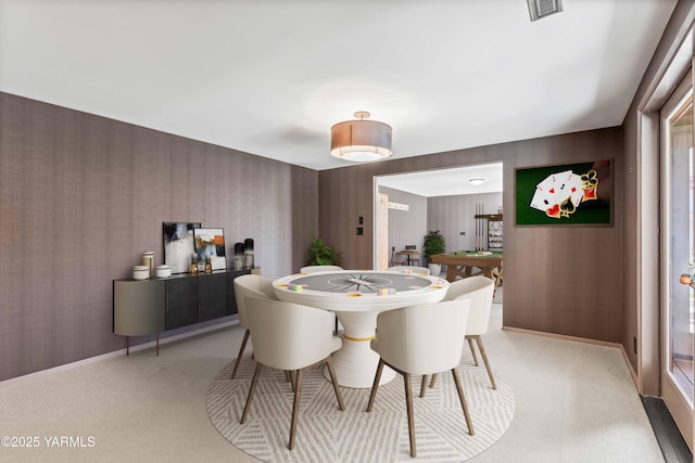 5902 Glacier Way, Yakima, WA 98908 - dining area with wallpapered walls, light colored carpet, and baseboards