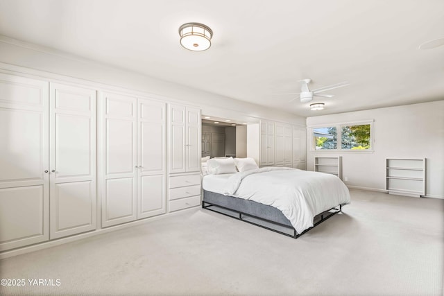 5902 Glacier Way, Yakima, WA 98908 - bedroom with light carpet, baseboards, and ceiling fan