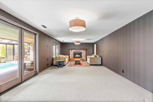 5902 Glacier Way, Yakima, WA 98908 - carpeted living area with a fireplace and baseboards