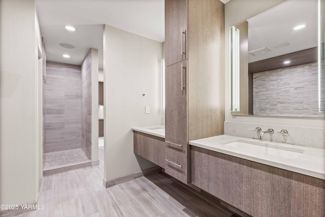 5902 Glacier Way, Yakima, WA 98908 - full bath featuring two vanities, tiled shower, and recessed lighting