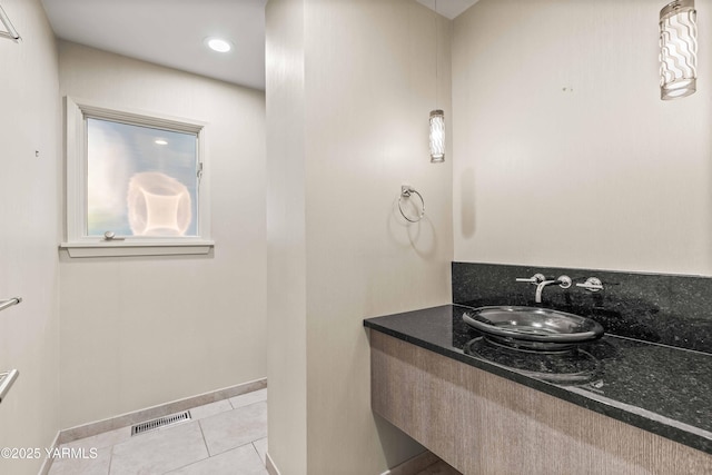 5902 Glacier Way, Yakima, WA 98908 - bathroom featuring tile patterned floors, vanity, and baseboards