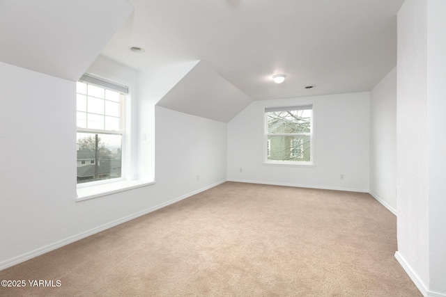 3703 W Chestnut Ave, Yakima, WA 98902 - additional living space featuring light carpet, baseboards, and lofted ceiling