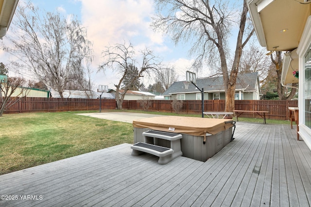 deck with a hot tub
