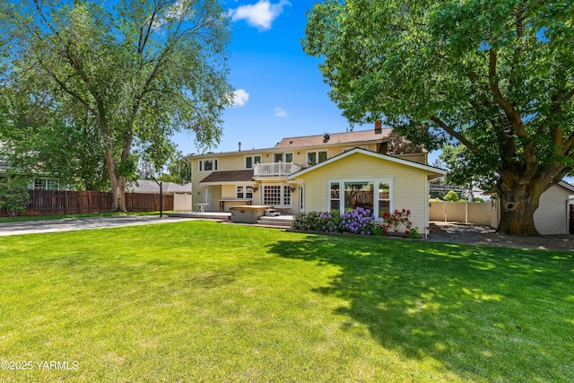 3703 W Chestnut Ave, Yakima, WA 98902 - rear view of property featuring a balcony and a chimney