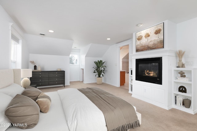 3703 W Chestnut Ave, Yakima, WA 98902 - bedroom with light carpet, recessed lighting, a glass covered fireplace, baseboards, and vaulted ceiling