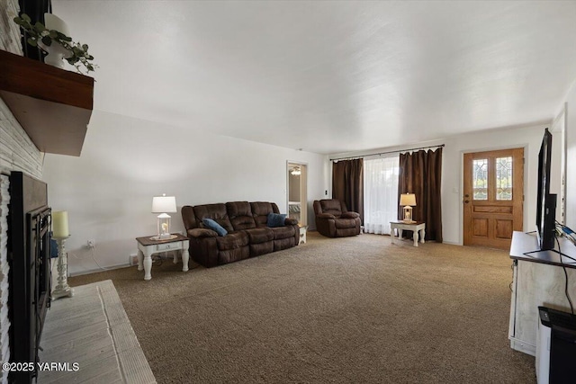 3700 Sheller Rd, Sunnyside, WA 98944 - carpeted living area with a fireplace with raised hearth