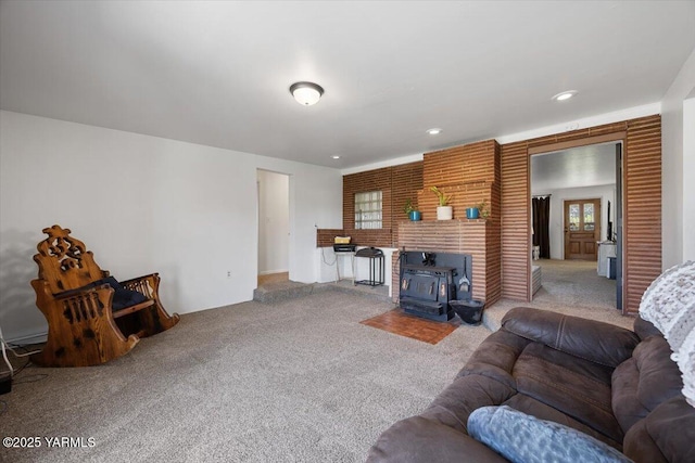 3700 Sheller Rd, Sunnyside, WA 98944 - living room with a wood stove, carpet, and recessed lighting