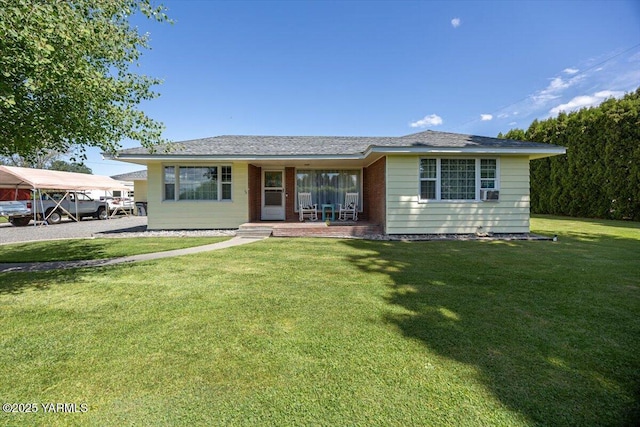3700 Sheller Rd, Sunnyside, WA 98944 - ranch-style home with a porch and a front yard