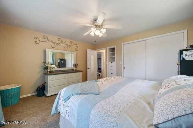 3700 Sheller Rd, Sunnyside, WA 98944 - carpeted bedroom with a closet, a ceiling fan, and baseboards