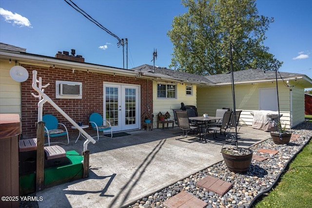 3700 Sheller Rd, Sunnyside, WA 98944 - back of house with french doors, a patio, and brick siding