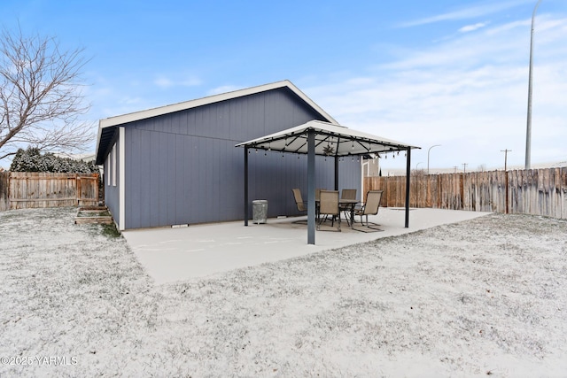 rear view of property featuring a patio and fence private yard