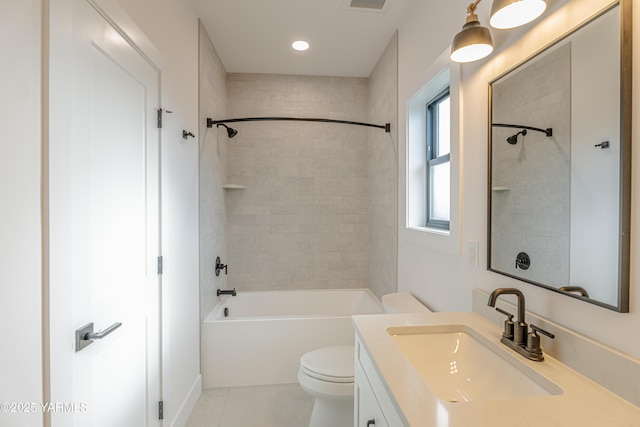 bathroom with shower / washtub combination, visible vents, toilet, vanity, and tile patterned flooring