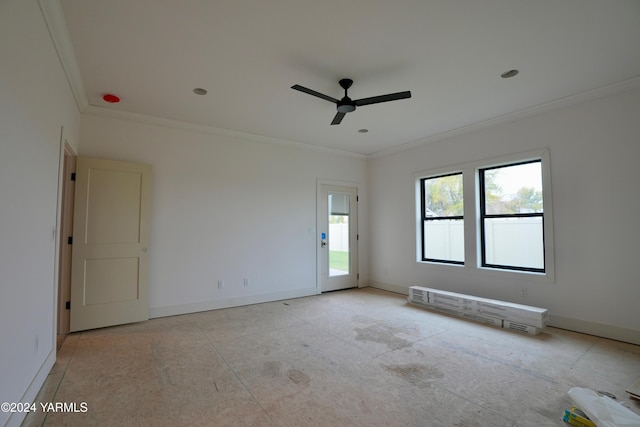 empty room with ornamental molding, ceiling fan, and baseboards