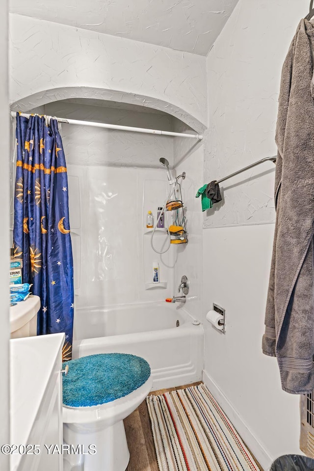 1311 W Mead Ave, Yakima, WA 98902 - full bathroom with toilet, shower / bath combo with shower curtain, vanity, and a textured wall