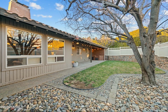 view of yard featuring a fenced backyard and a patio