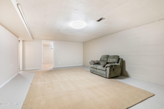 unfurnished room featuring visible vents and light colored carpet