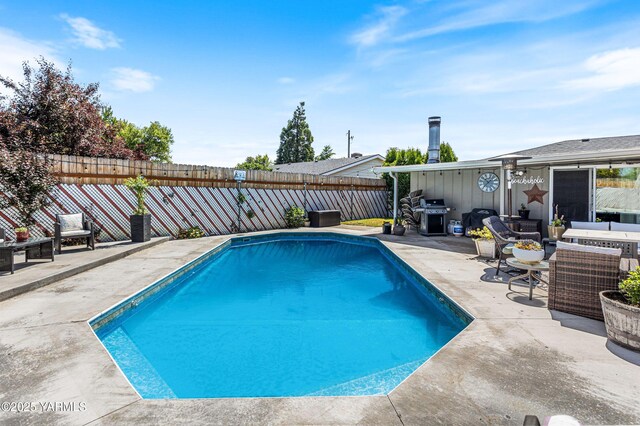 3603 Carol Ave, Yakima, WA 98902 - view of swimming pool with a patio area, a fenced backyard, and area for grilling
