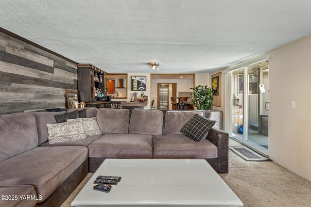 3603 Carol Ave, Yakima, WA 98902 - carpeted living room with wooden walls and a textured ceiling