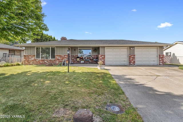 3603 Carol Ave, Yakima, WA 98902 - single story home with brick siding, board and batten siding, concrete driveway, and a garage