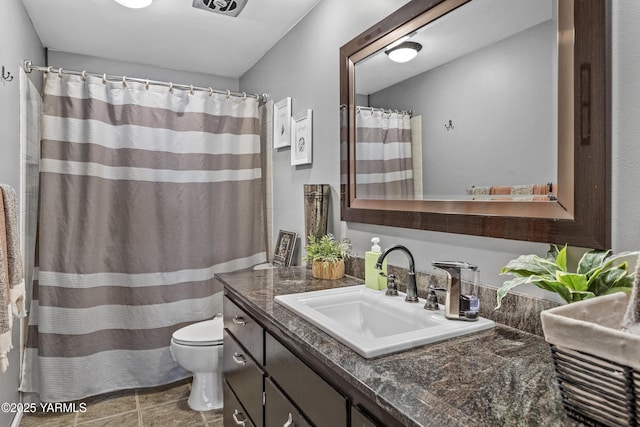 3603 Carol Ave, Yakima, WA 98902 - bathroom with vanity, toilet, and curtained shower