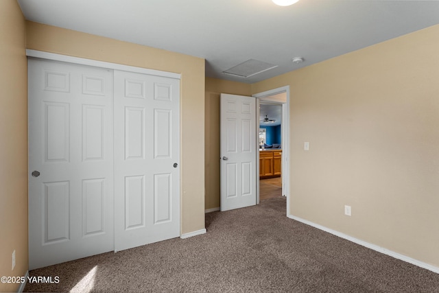 710 Columbus Ave, Moxee, WA 98936 - unfurnished bedroom with carpet, a closet, and attic access