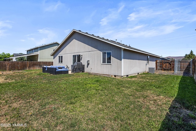 710 Columbus Ave, Moxee, WA 98936 - back of property featuring outdoor lounge area and a fenced backyard
