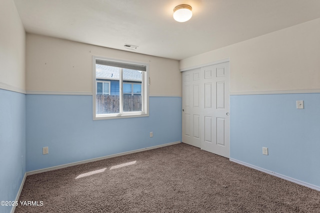 710 Columbus Ave, Moxee, WA 98936 - unfurnished bedroom featuring carpet and a closet