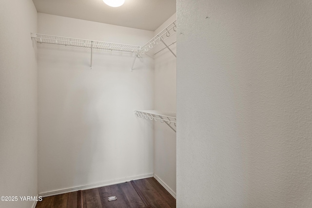 710 Columbus Ave, Moxee, WA 98936 - spacious closet with dark wood-style floors