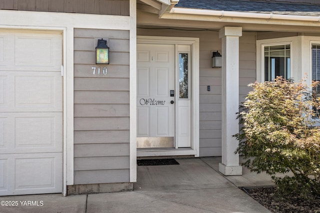 710 Columbus Ave, Moxee, WA 98936 - view of exterior entry featuring covered porch and roof with shingles