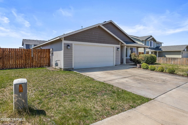 710 Columbus Ave, Moxee, WA 98936 - view of front of property featuring a garage and concrete driveway