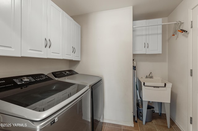 710 Columbus Ave, Moxee, WA 98936 - laundry room with cabinet space, independent washer and dryer, and tile patterned floors