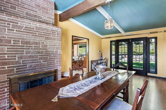 611 Ferncrest Rd, Yakima, WA 98901 - dining room with an inviting chandelier, ornamental molding, and wood finished floors