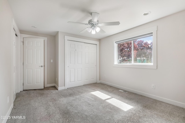 851 E Selah Rd, Yakima, WA 98901 - unfurnished bedroom with carpet floors, baseboards, and a closet
