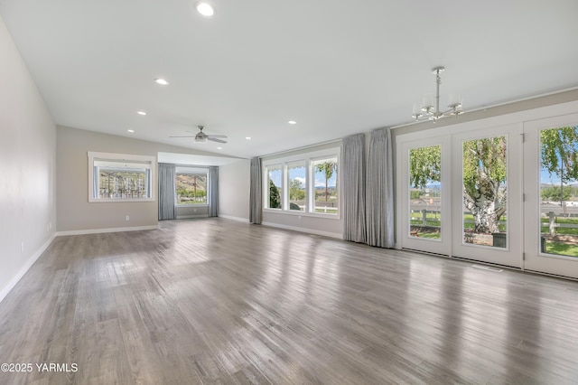 851 E Selah Rd, Yakima, WA 98901 - unfurnished living room featuring a chandelier, baseboards, recessed lighting, wood finished floors, and a ceiling fan