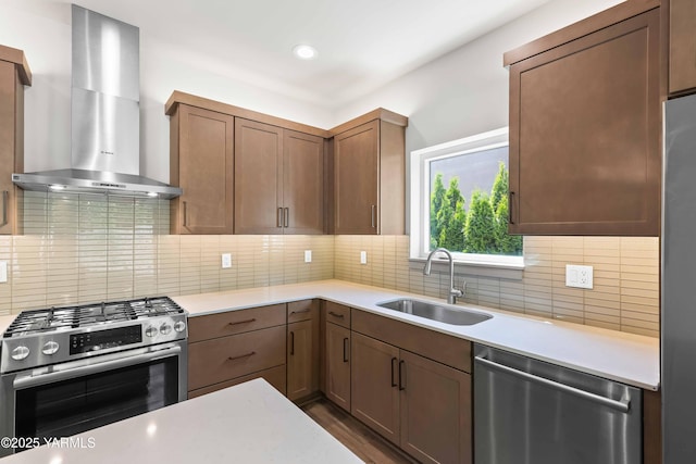 4303 Tayhill Way, Yakima, WA 98908 - kitchen with stainless steel appliances, wall chimney exhaust hood, a sink, light countertops, and recessed lighting