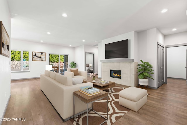 4303 Tayhill Way, Yakima, WA 98908 - living room with hardwood / wood-style flooring, a tiled fireplace, recessed lighting, and baseboards