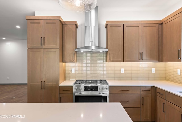 4303 Tayhill Way, Yakima, WA 98908 - kitchen featuring stainless steel range with gas stovetop, wall chimney exhaust hood, tasteful backsplash, light countertops, and recessed lighting
