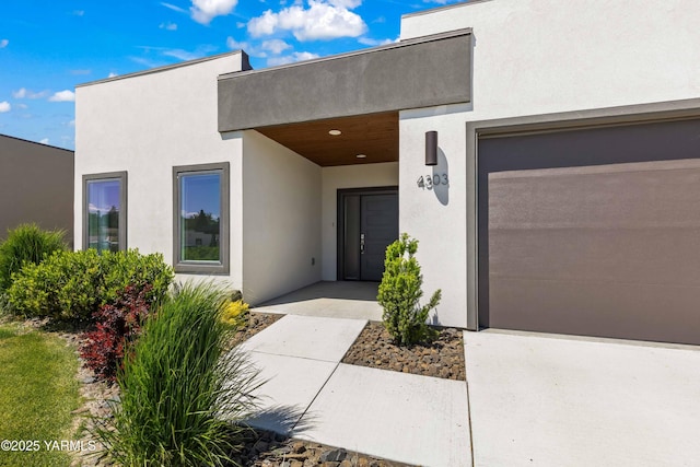 4303 Tayhill Way, Yakima, WA 98908 - view of exterior entry with stucco siding and an attached garage