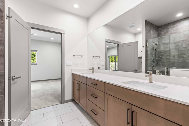 4303 Tayhill Way, Yakima, WA 98908 - bathroom featuring a shower stall, plenty of natural light, tile patterned flooring, double vanity, and recessed lighting