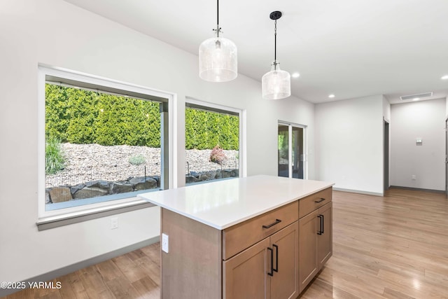 4303 Tayhill Way, Yakima, WA 98908 - kitchen with light wood-style flooring, healthy amount of natural light, light countertops, and recessed lighting