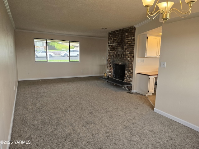 unfurnished living room with an inviting chandelier, ornamental molding, and carpet floors