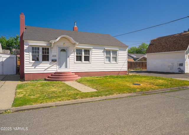 1309 W Spruce St, Yakima, WA 98902 - view of front of home with entry steps and a chimney