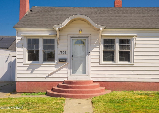 1309 W Spruce St, Yakima, WA 98902 - doorway to property with a chimney and roof with shingles