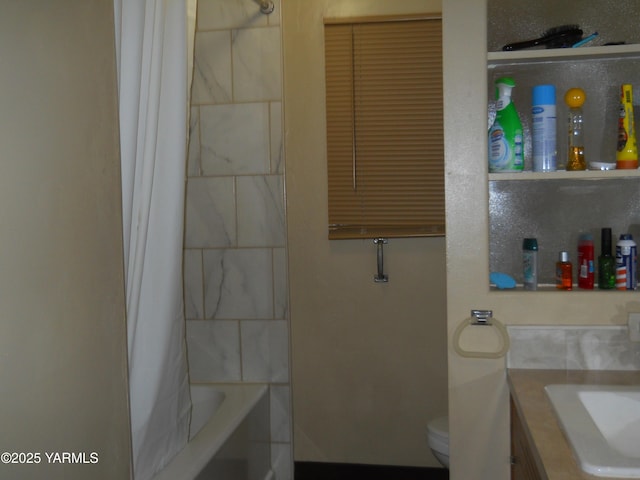 bathroom featuring shower / tub combo with curtain, vanity, and toilet