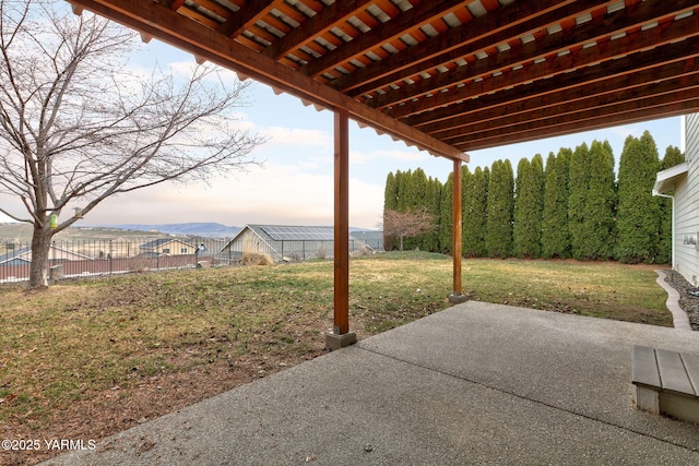 view of patio / terrace with fence