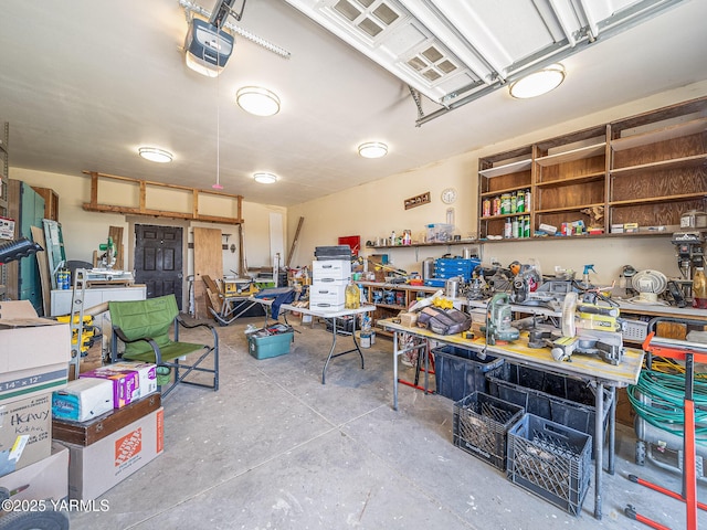 230 Krough Rd, Prosser, WA 99350 - garage with a workshop area and a garage door opener