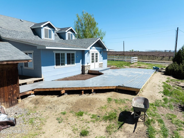 230 Krough Rd, Prosser, WA 99350 - exterior space with french doors, fence, a wooden deck, and a shingled roof