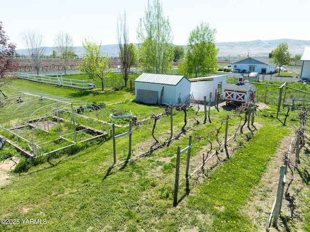 230 Krough Rd, Prosser, WA 99350 - view of yard with an outbuilding, fence, an outdoor structure, a mountain view, and a rural view